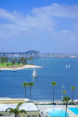 a view of a city with an ocean view
