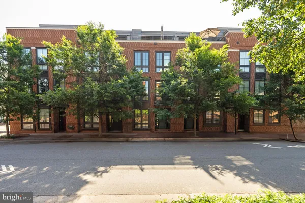 a view of a building and trees