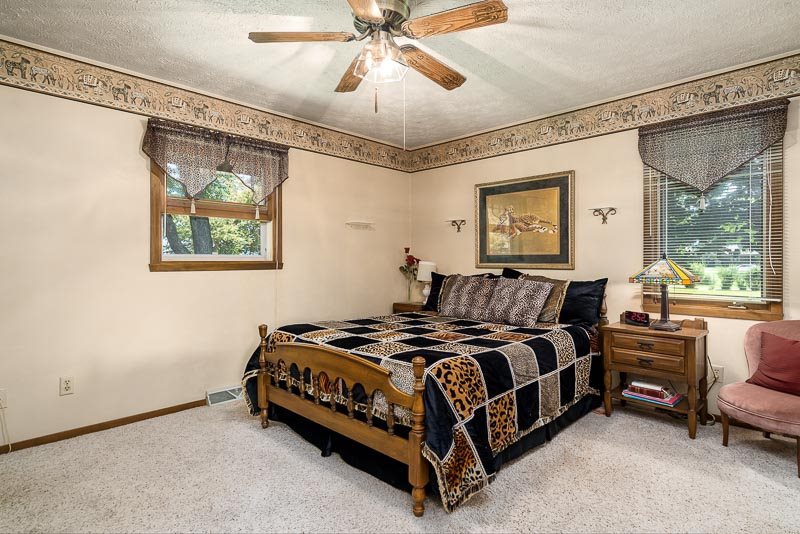 3644 Cutty Sark Road Cherry Valley, IL 61016 - Photo 17 of 33 a bedroom with a bed and window