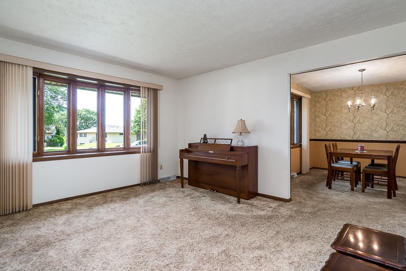 3644 Cutty Sark Road Cherry Valley, IL 61016 - Photo 3 of 33 a room with furniture and window