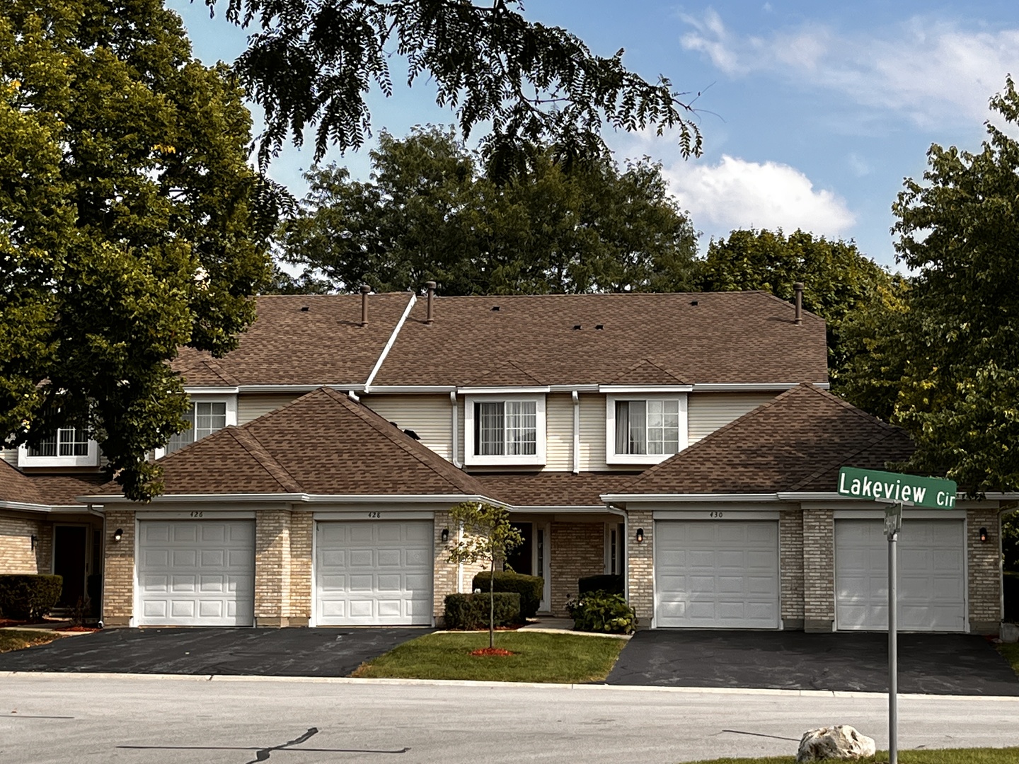 426 Lakeview Circle Bolingbrook, IL 60440 - Photo 1 of 1 a front view of a house with garage