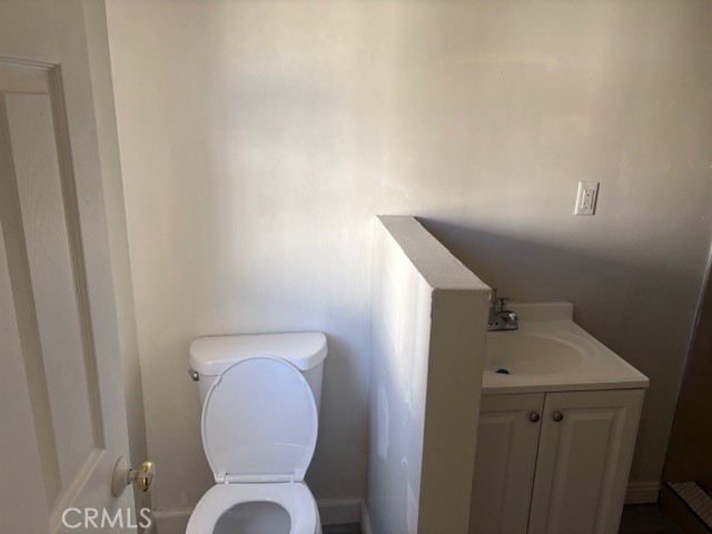 451 West Yermo Road Yermo, CA 92398 - Photo 14 of 23 a bathroom with a toilet and a sink