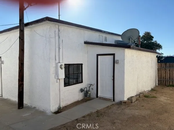 a view of a door in front of a house