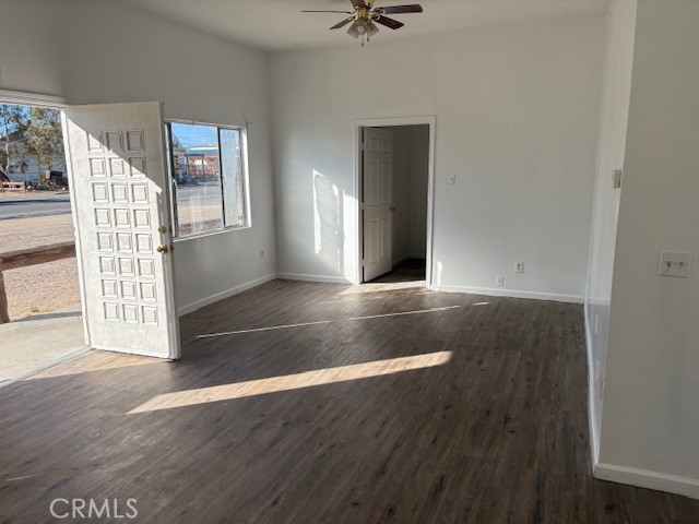 451 West Yermo Road Yermo, CA 92398 - Photo 3 of 23 wooden floor in an empty room with a window
