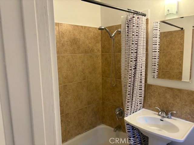 451 West Yermo Road Yermo, CA 92398 - Photo 7 of 23 a bathroom with a sink shower and a mirror