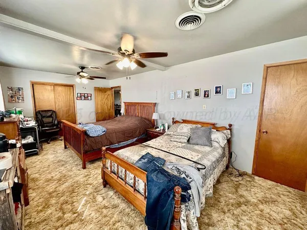 a room with furniture and a window