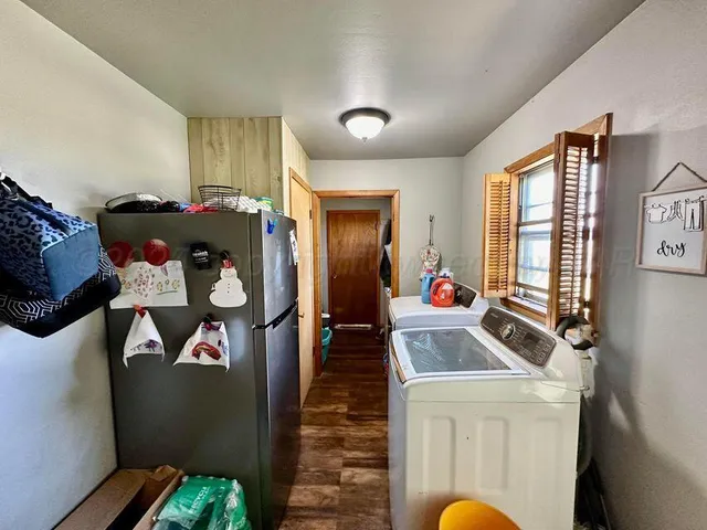 a bed room with furniture and a window
