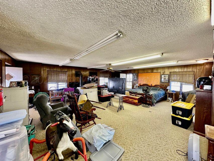 15200 Highway 152 Wheeler, TX 79096 - Photo 19 of 71 a view of a room with lots of gym equipment