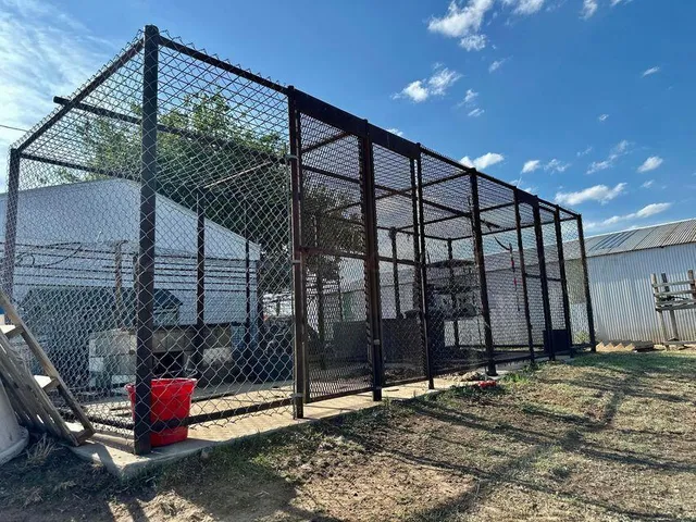 a view of dirt yard with a trees