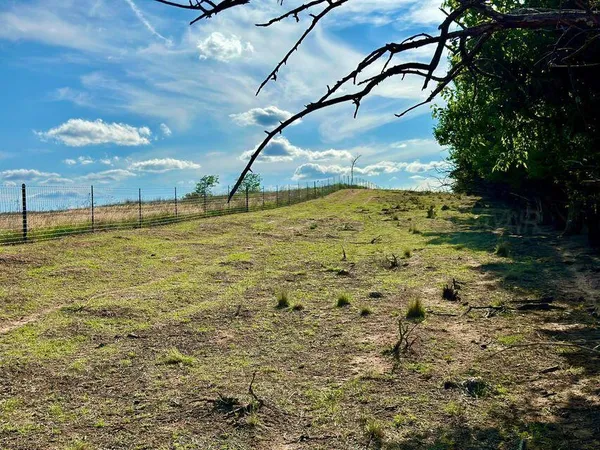 a view of an outdoor space and a yard