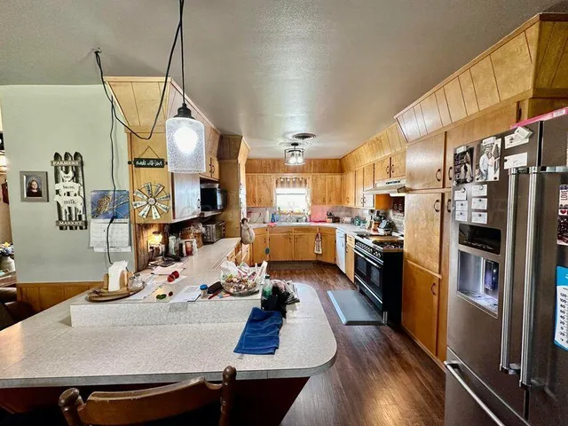 a kitchen with a stove and a cabinet