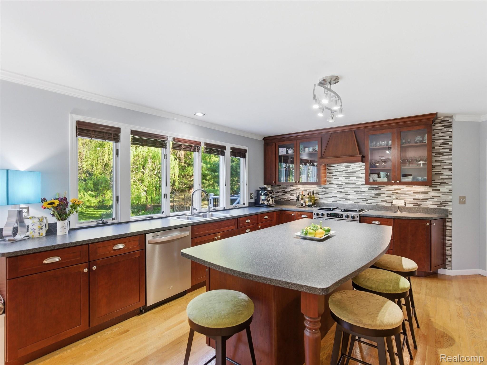 1185 Avon Circle West Rochester, MI 48309 - Photo 15 of 74 Large Island Kitchen perfect for gatherings and entertaining