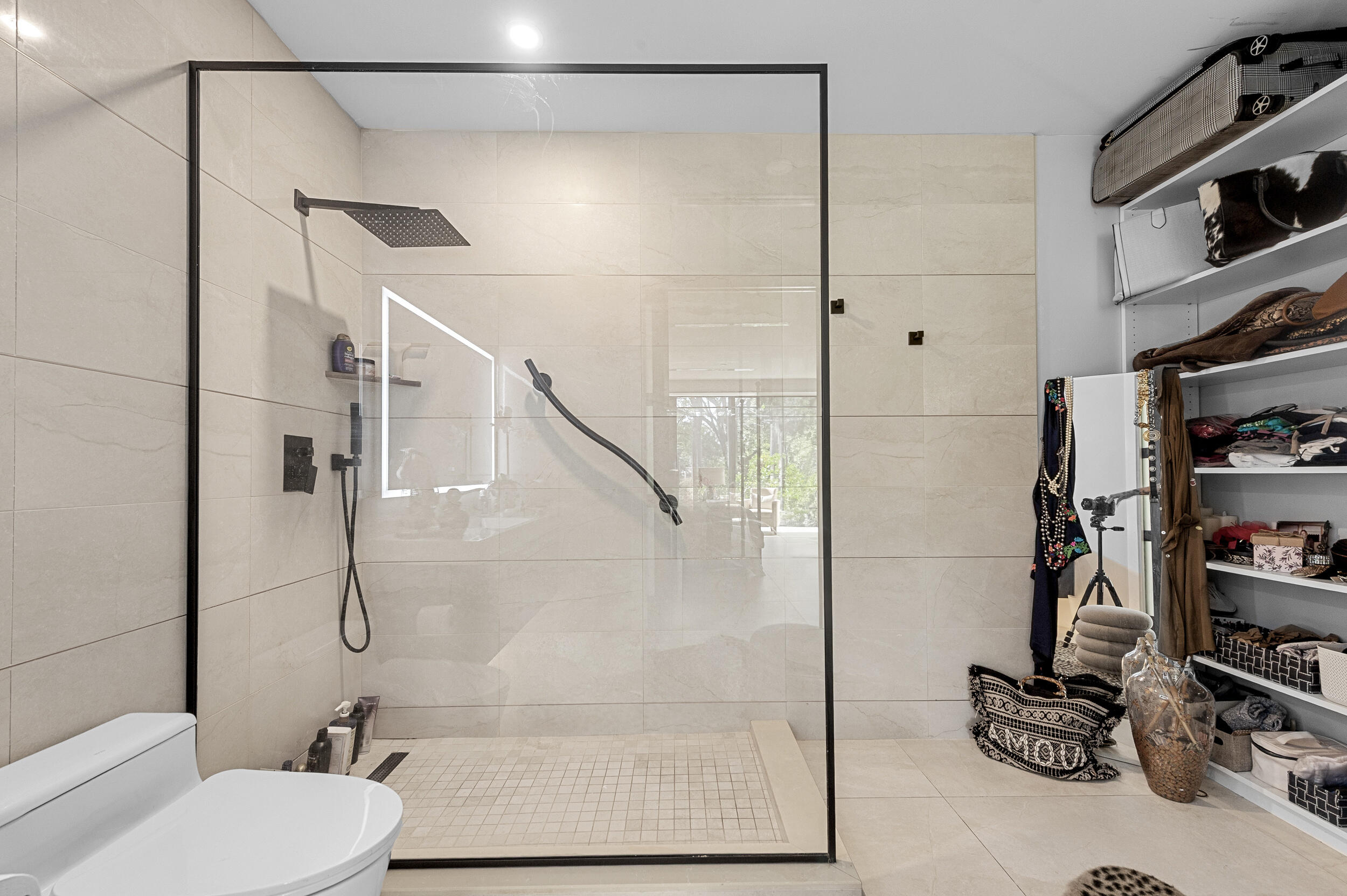 7819 Lakeside Boulevard, Unit 814 Boca Raton, FL 33434 - Photo 15 of 37 a bathroom with a shower