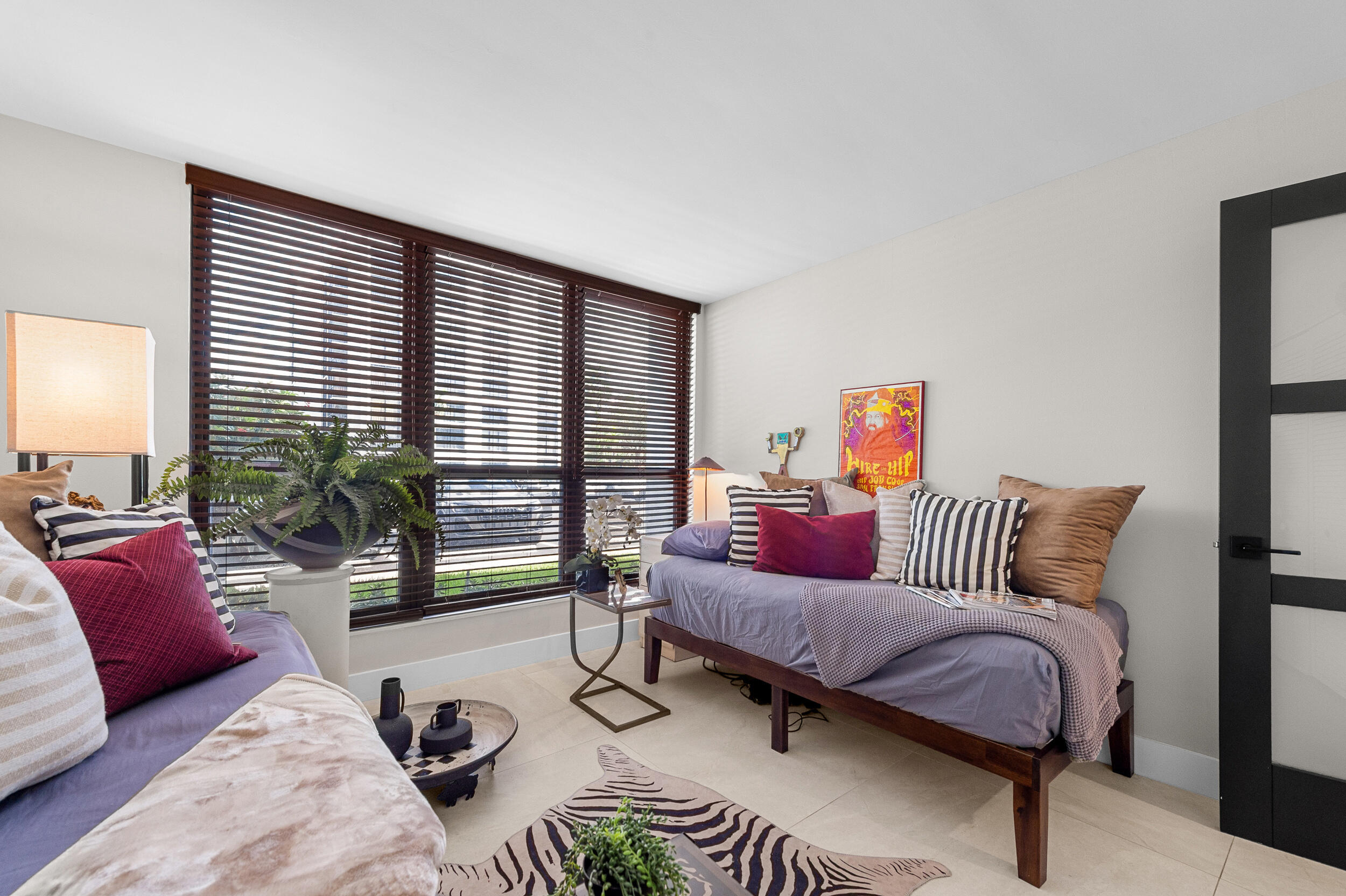 7819 Lakeside Boulevard, Unit 814 Boca Raton, FL 33434 - Photo 19 of 37 a living room with furniture and a large window
