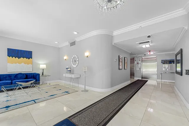 a view of a hallway with stairs