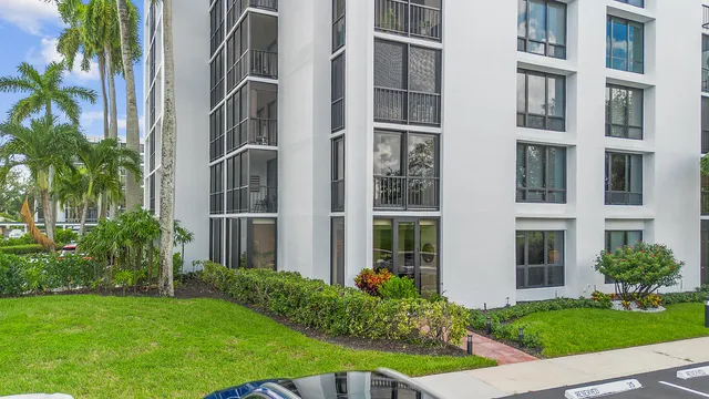 a view of a swimming pool with a garden