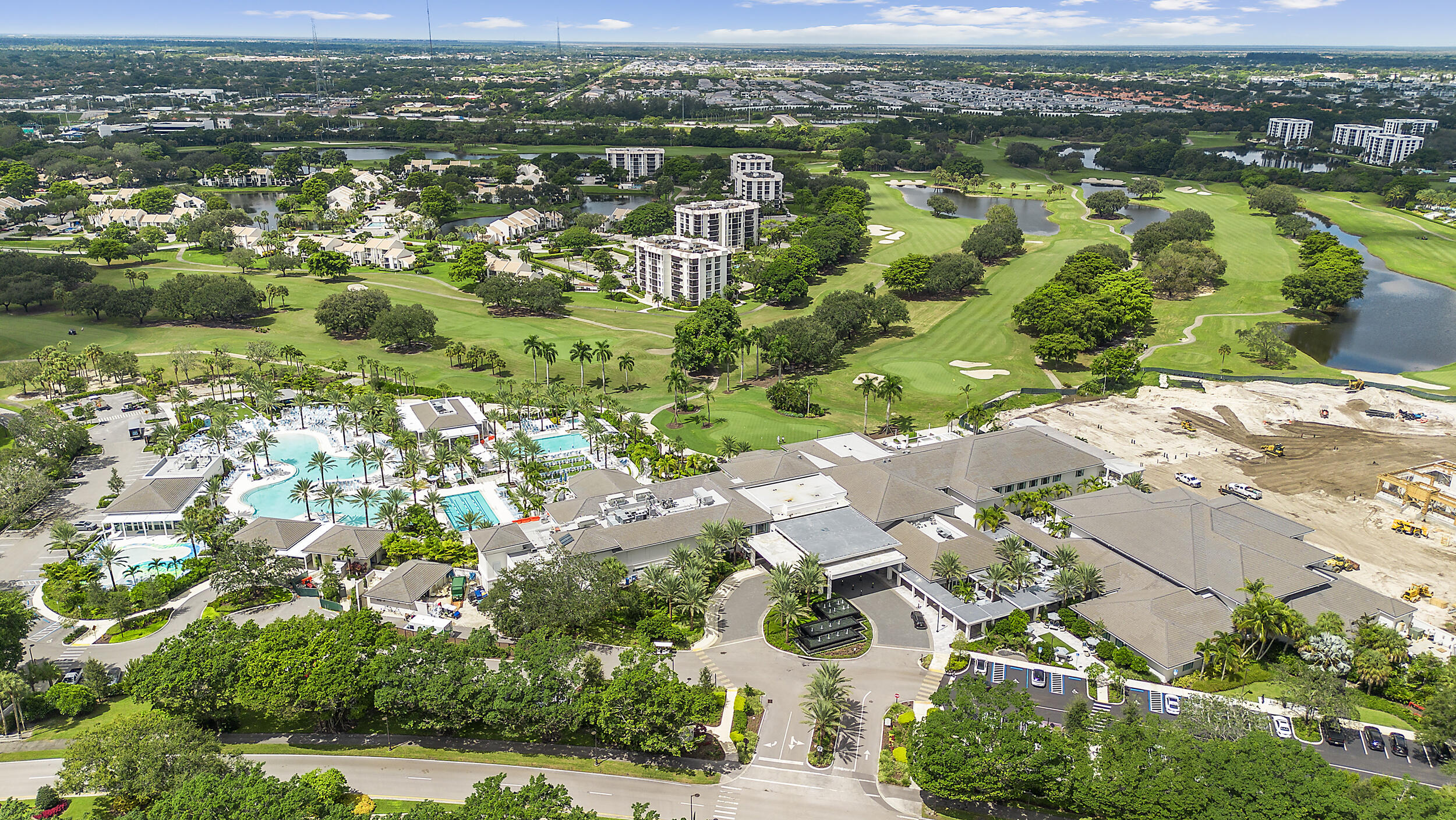 7819 Lakeside Boulevard, Unit 814 Boca Raton, FL 33434 - Photo 32 of 37 an aerial view of residential houses with outdoor space and trees