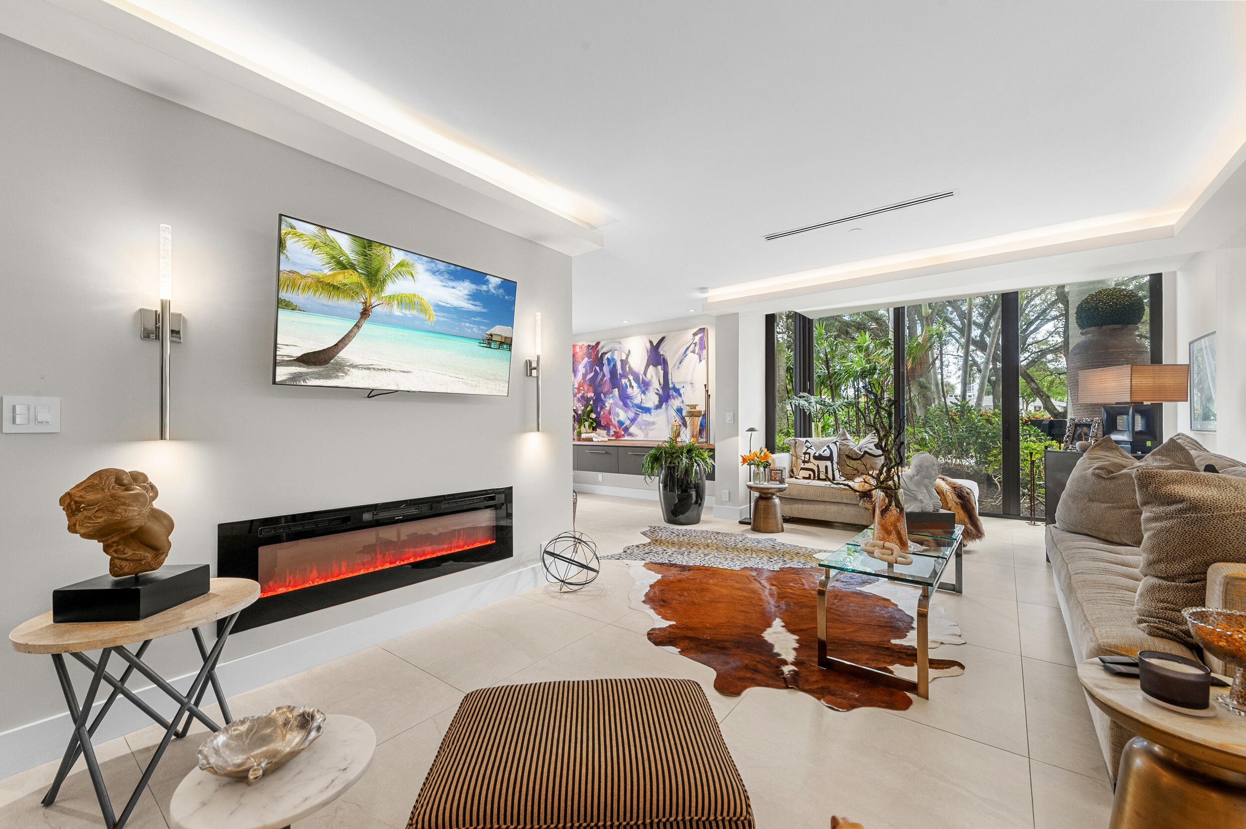 7819 Lakeside Boulevard, Unit 814 Boca Raton, FL 33434 - Photo 6 of 37 a living room with furniture and a floor to ceiling window