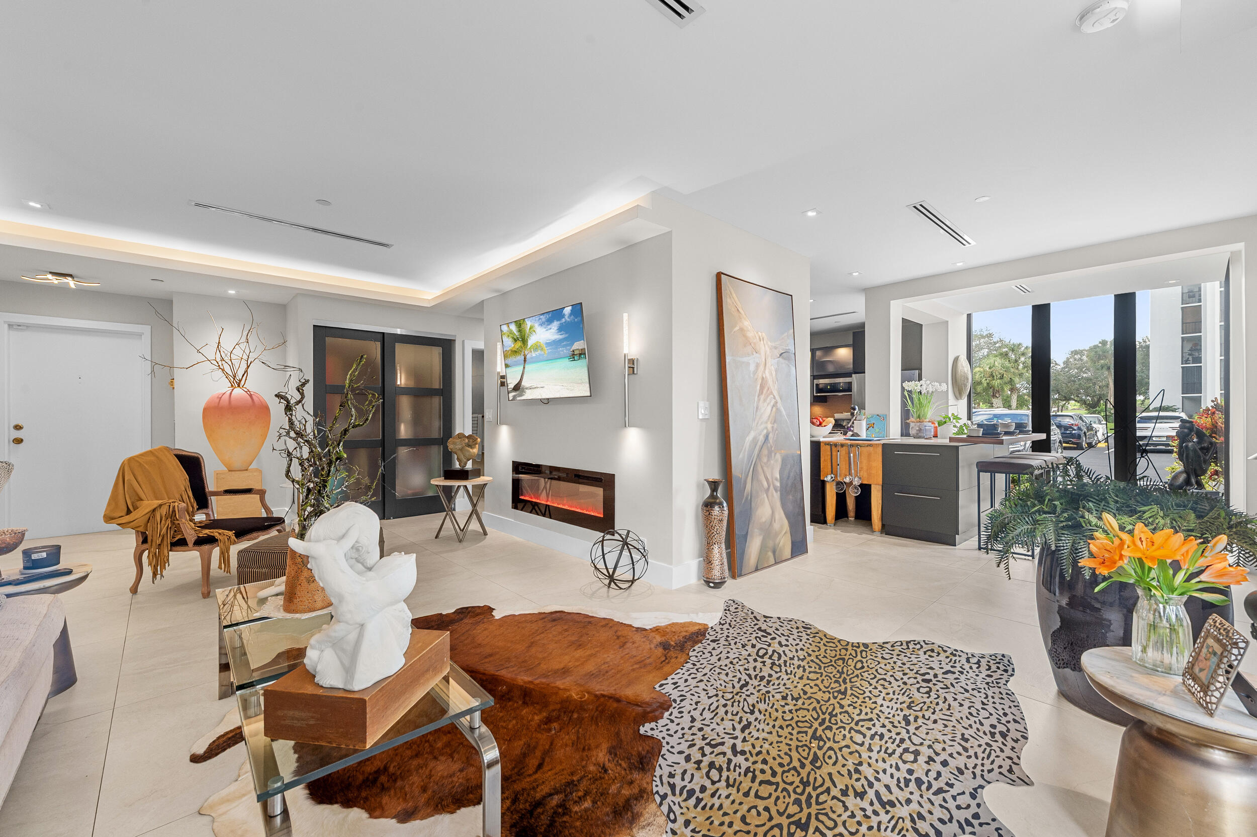 7819 Lakeside Boulevard, Unit 814 Boca Raton, FL 33434 - Photo 8 of 37 a living room filled with furniture