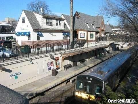 15 Canterbury Road, Unit D6 Great Neck, NY 11021 - Photo 17 of 21 a view of a house with roof and furniture