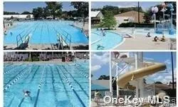 an aerial view of a house with swimming pool