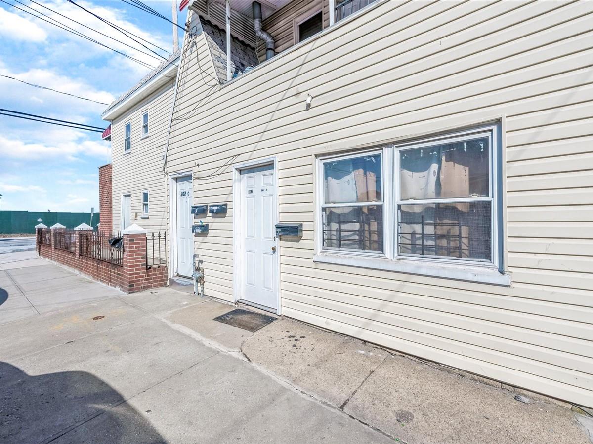 362 Beach 88th Street Queens, NY 11693 - Photo 5 of 16 a view of a house with a outdoor space