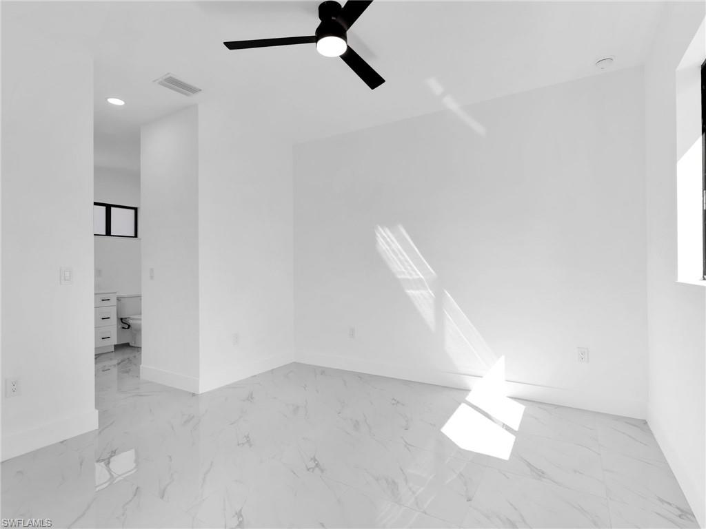 3417 8th Street Southwest Lehigh Acres, FL 33976 - Photo 14 of 32 a view of a room with utility