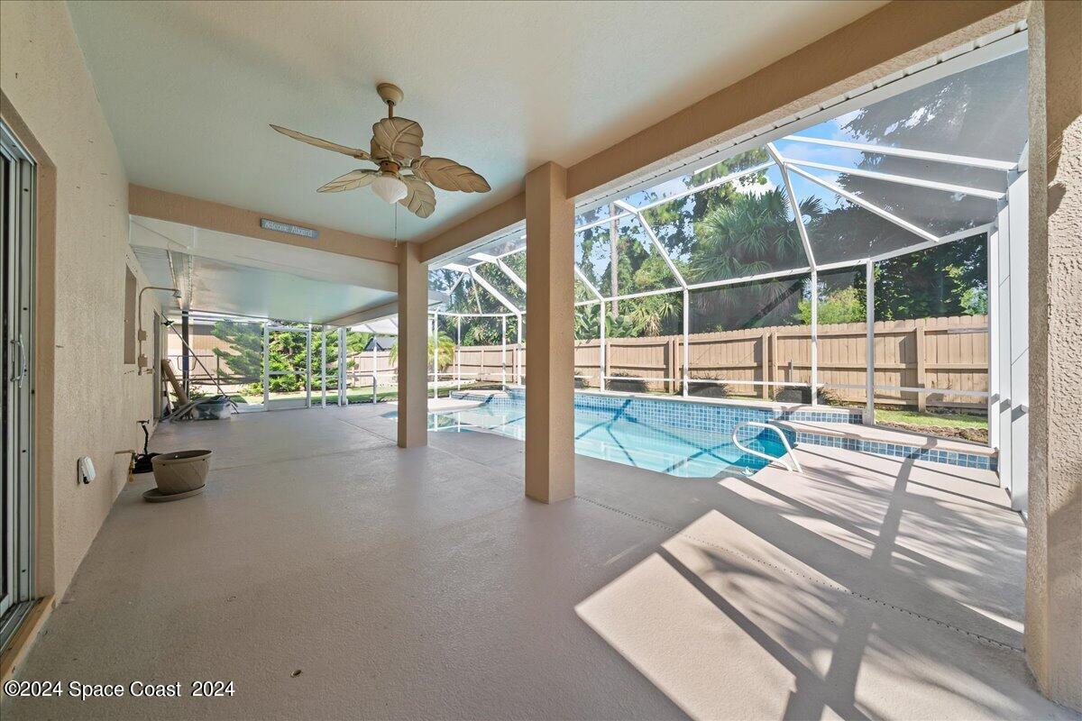 432 Stonehenge Circle Rockledge, FL 32955 - Photo 18 of 41 a view of a porch with wooden floor