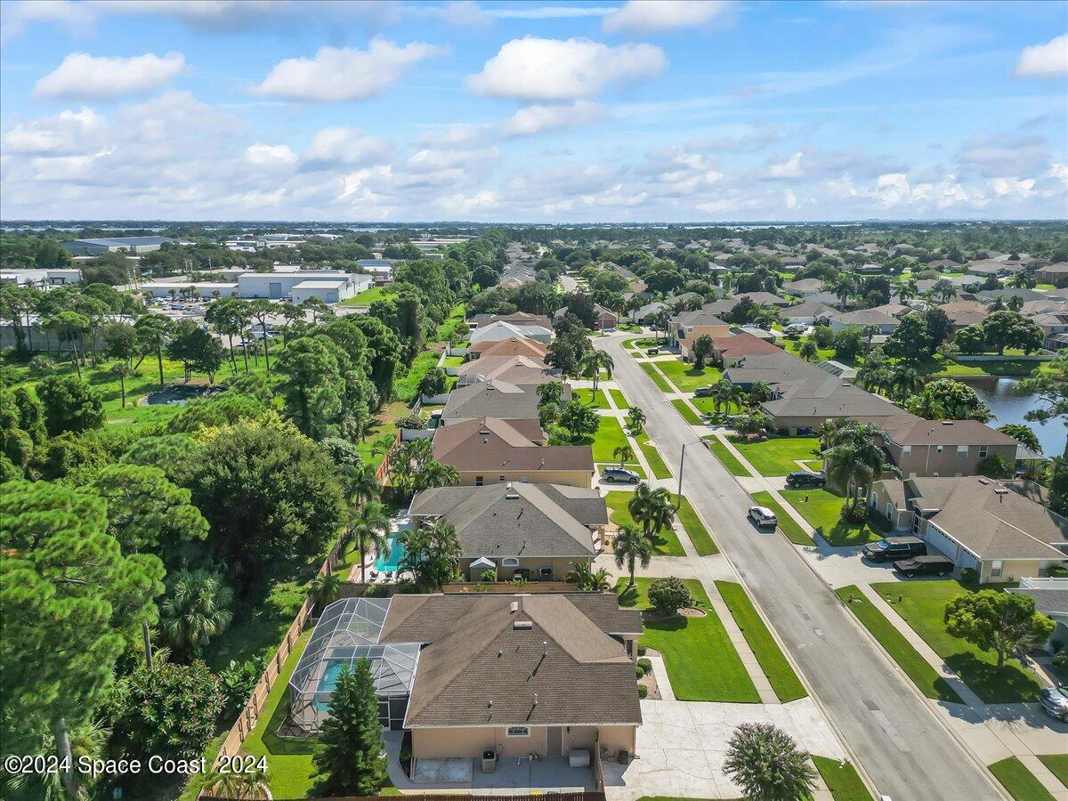 432 Stonehenge Circle Rockledge, FL 32955 - Photo 37 of 41 an aerial view of residential houses with outdoor space