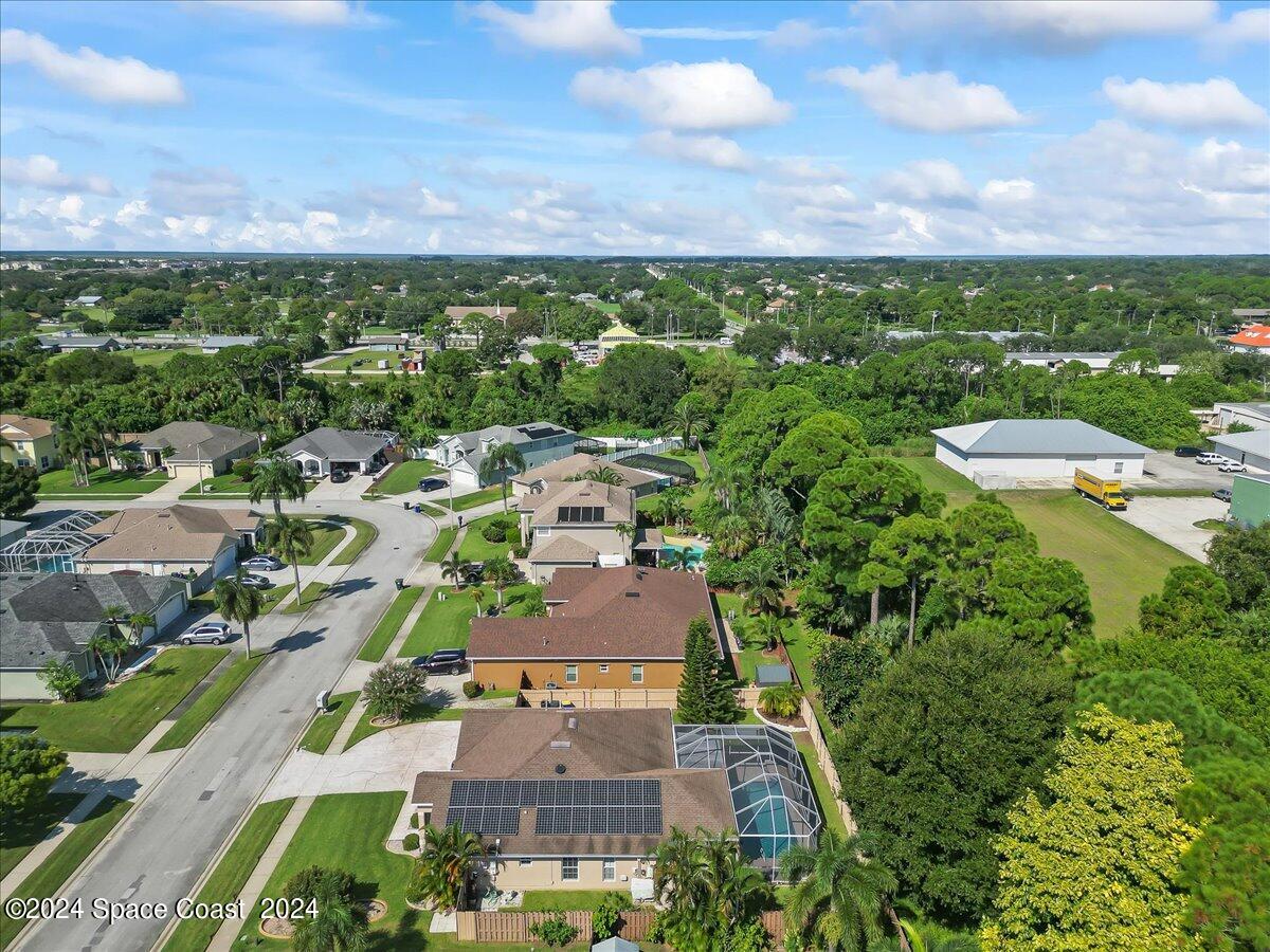 432 Stonehenge Circle Rockledge, FL 32955 - Photo 38 of 41 an aerial view of residential houses with outdoor space and trees
