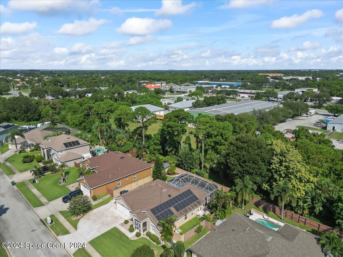 432 Stonehenge Circle Rockledge, FL 32955 - Photo 39 of 41 an aerial view of residential houses with outdoor space and trees