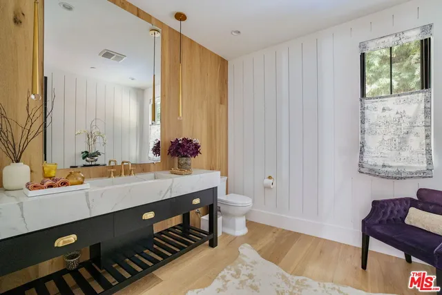 a outdoor living space with patio furniture and potted plants