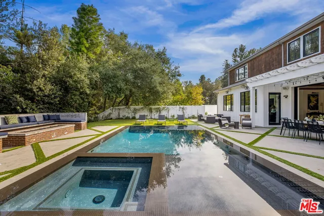 a view of a cafe with sitting area