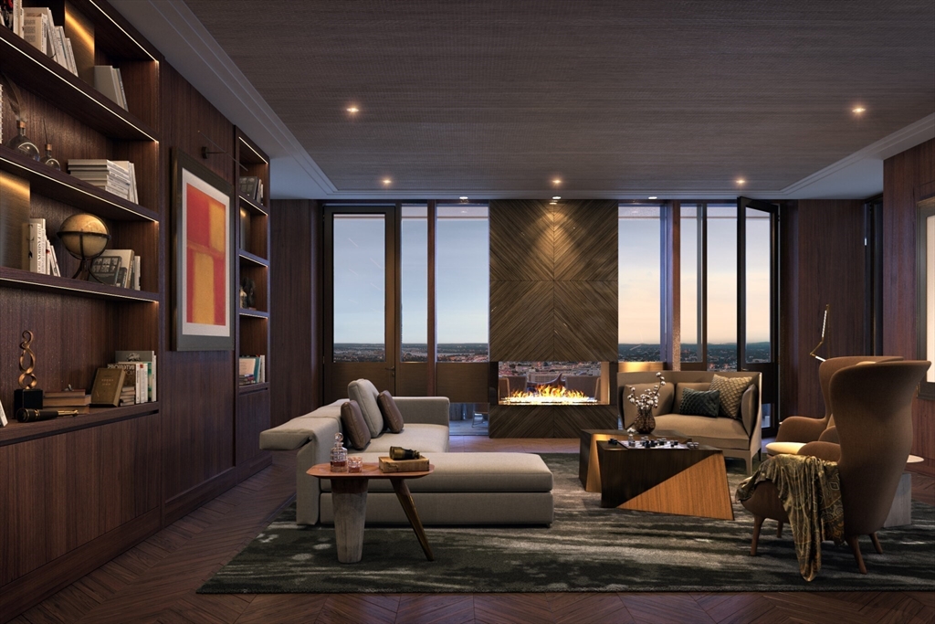 40 Trinity Place, Unit 1605 Boston, MA 02116 - Photo 12 of 16 a living room with furniture and large windows