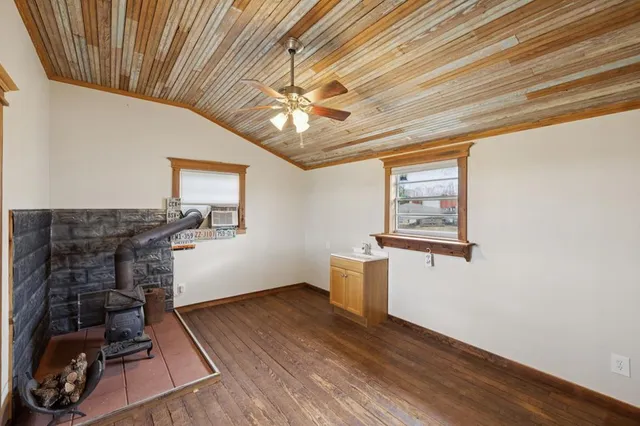 a view of entryway with wooden floor