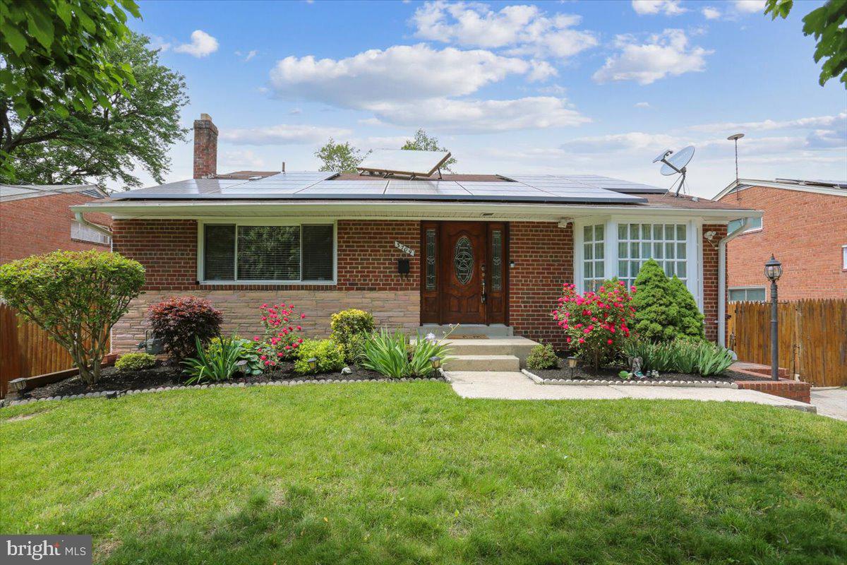 3709 Kenway Street Silver Spring, MD 20906 - Photo 1 of 34 a front view of a house with garden