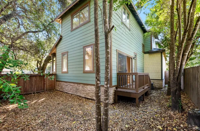 a view of a house with a door and glass door