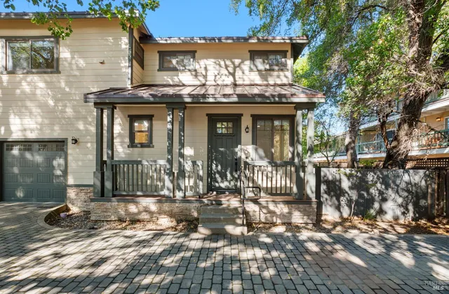 a front view of a house with a porch