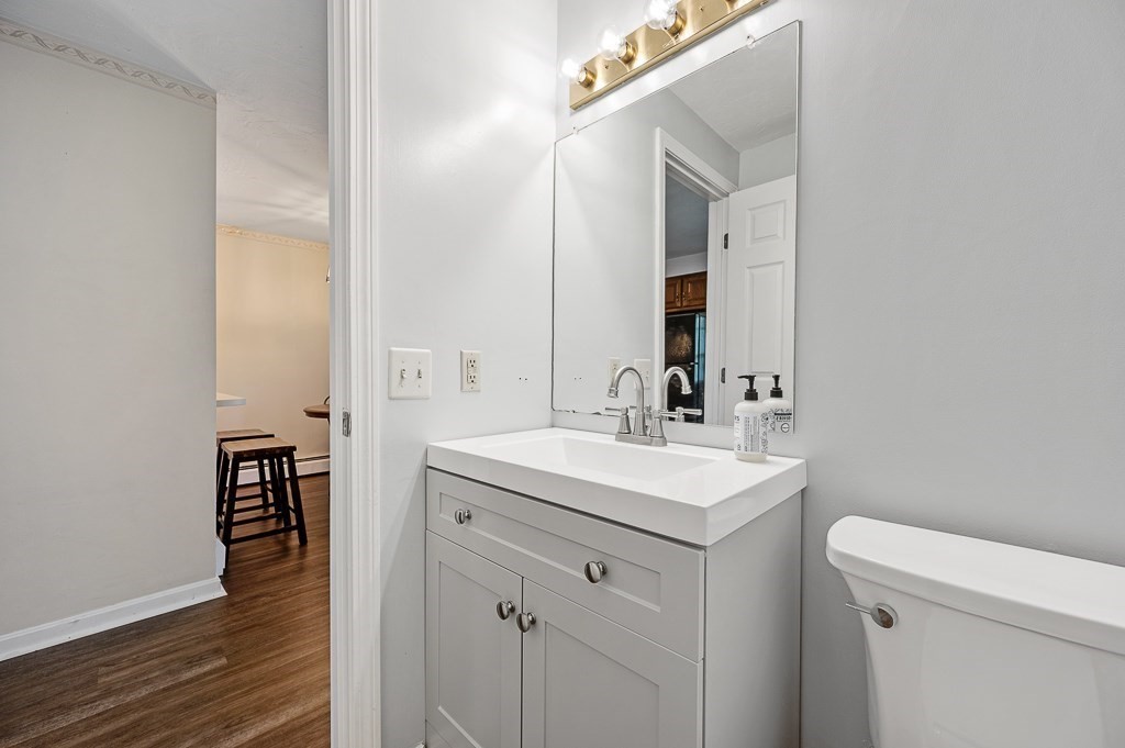 4 Tuck Farm Road, Unit 6 Auburn, MA 01501 - Photo 11 of 20 a bathroom with a sink and a toilet