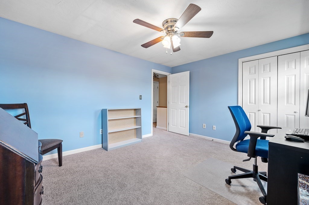 4 Tuck Farm Road, Unit 6 Auburn, MA 01501 - Photo 18 of 20 a view of a workspace with furniture and a window