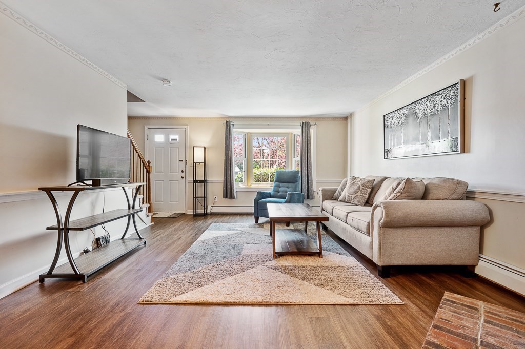 4 Tuck Farm Road, Unit 6 Auburn, MA 01501 - Photo 7 of 20 a living room with furniture