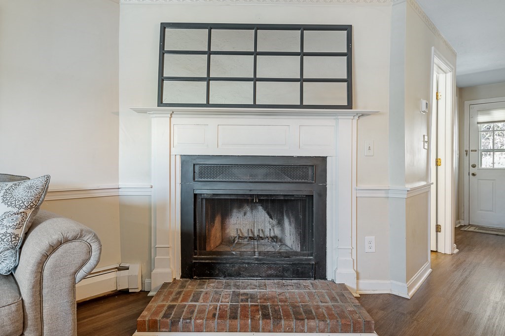4 Tuck Farm Road, Unit 6 Auburn, MA 01501 - Photo 9 of 20 a living room with furniture and a fireplace