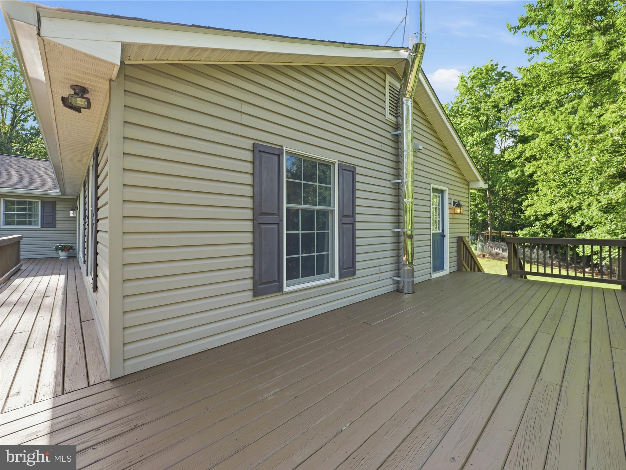 286 Tub Run Hollow Road Hedgesville, WV 25427 - Photo 45 of 72 The wraparound deck is great for parties!