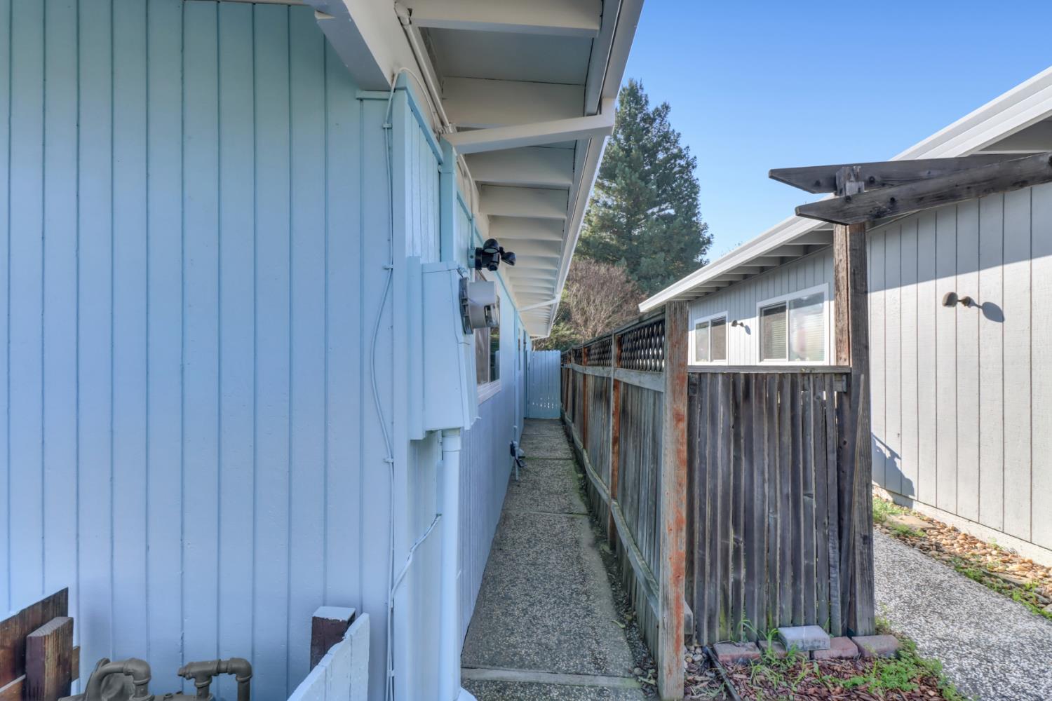 3216 Trawler Place Davis, CA 95616 - Photo 3 of 38 a view of a house with wooden fence