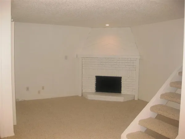 a room with a fireplace