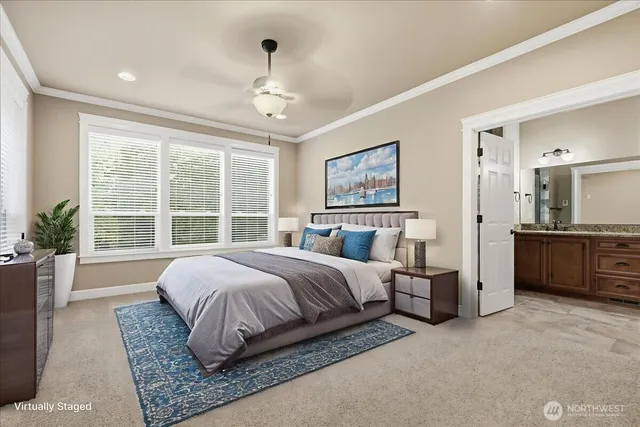 a spacious bedroom with a large bed and a couch