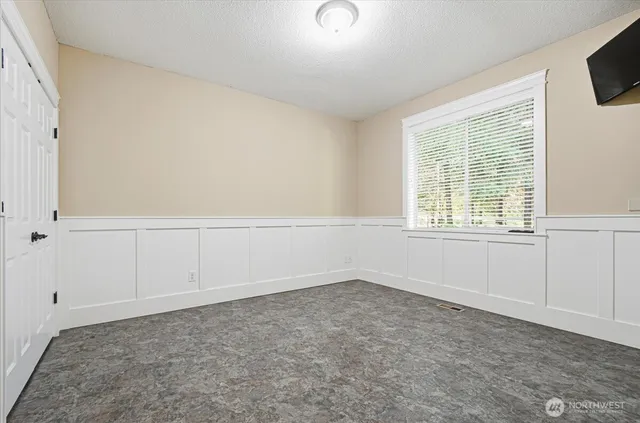 an empty room with a window