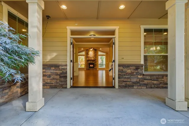 an empty room with fireplace