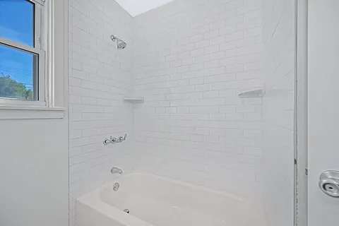 a bathroom with a bathtub