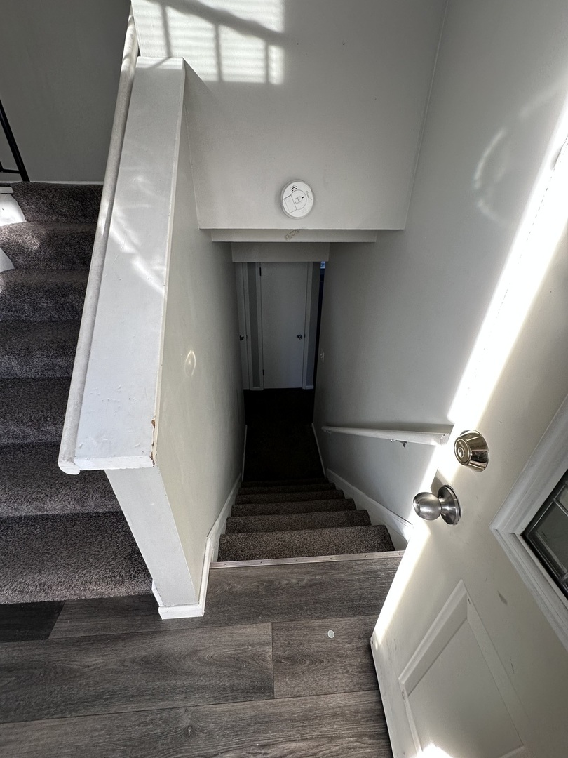 100 West 3rd Street Sublette, IL 61367 - Photo 11 of 18 a view of entryway and hall with wooden floor